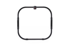 Black camera cage with textured side grips and top mounting point for DSLR or mirrorless video rigs